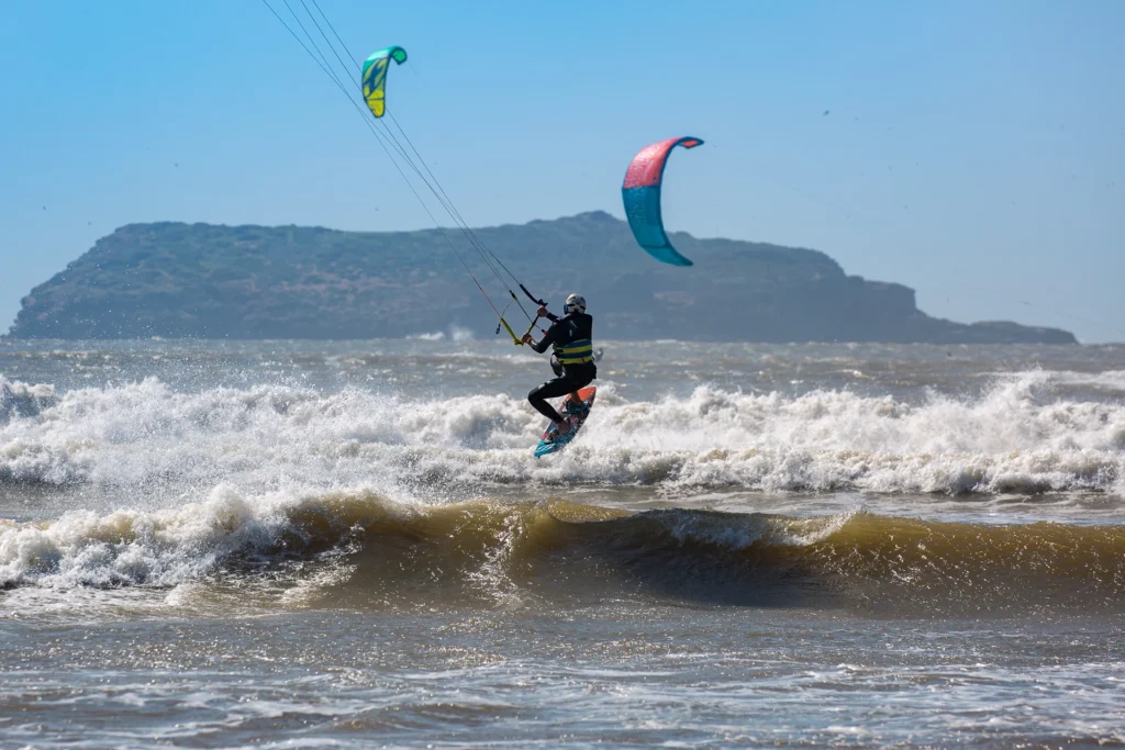 Kitesurfer riding waves in Essaouira